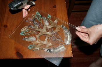 clamping leaves on glass suncatcher
